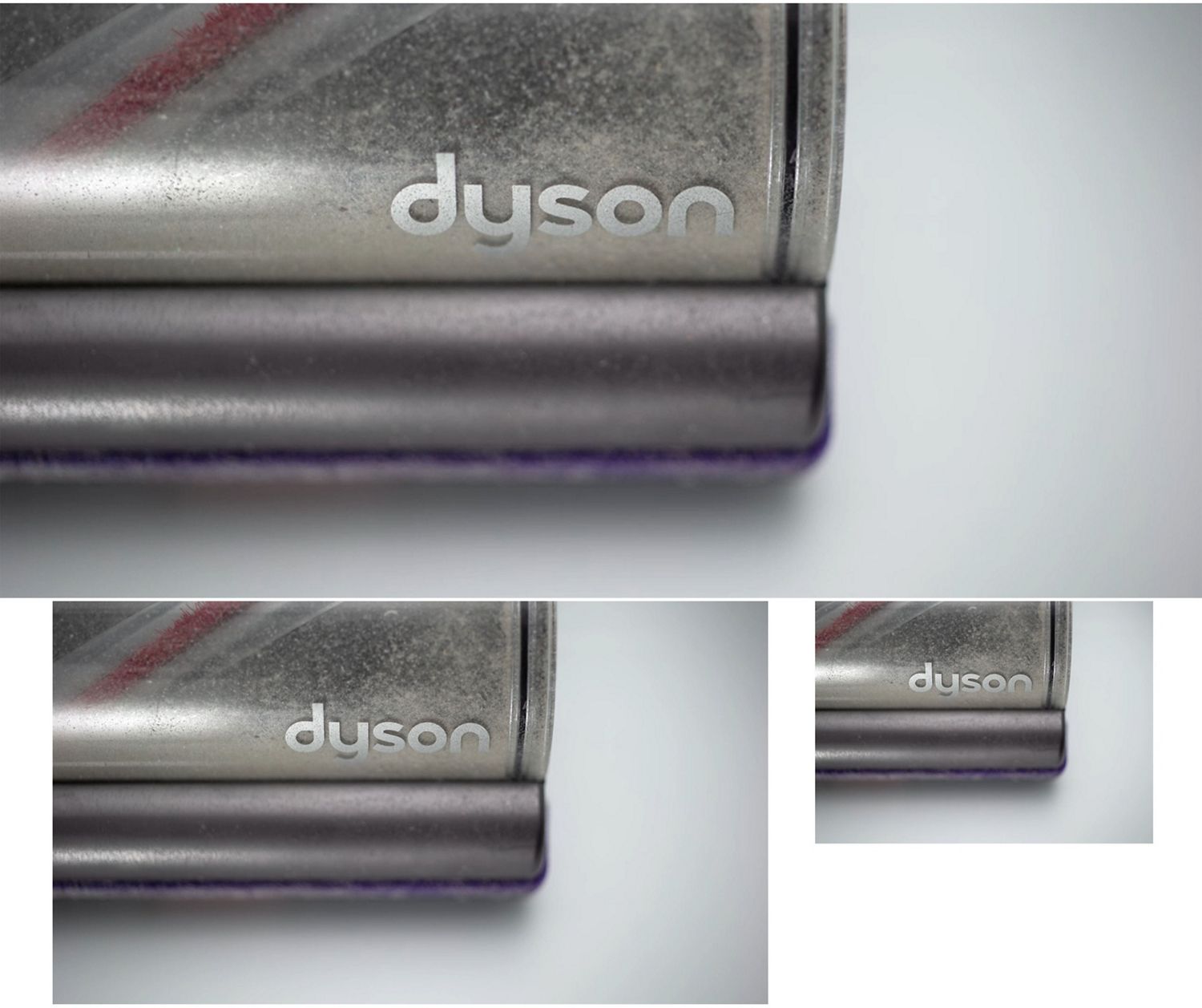 Close-up of the Dyson logo on the cleaner head of a vacuum cleaner.